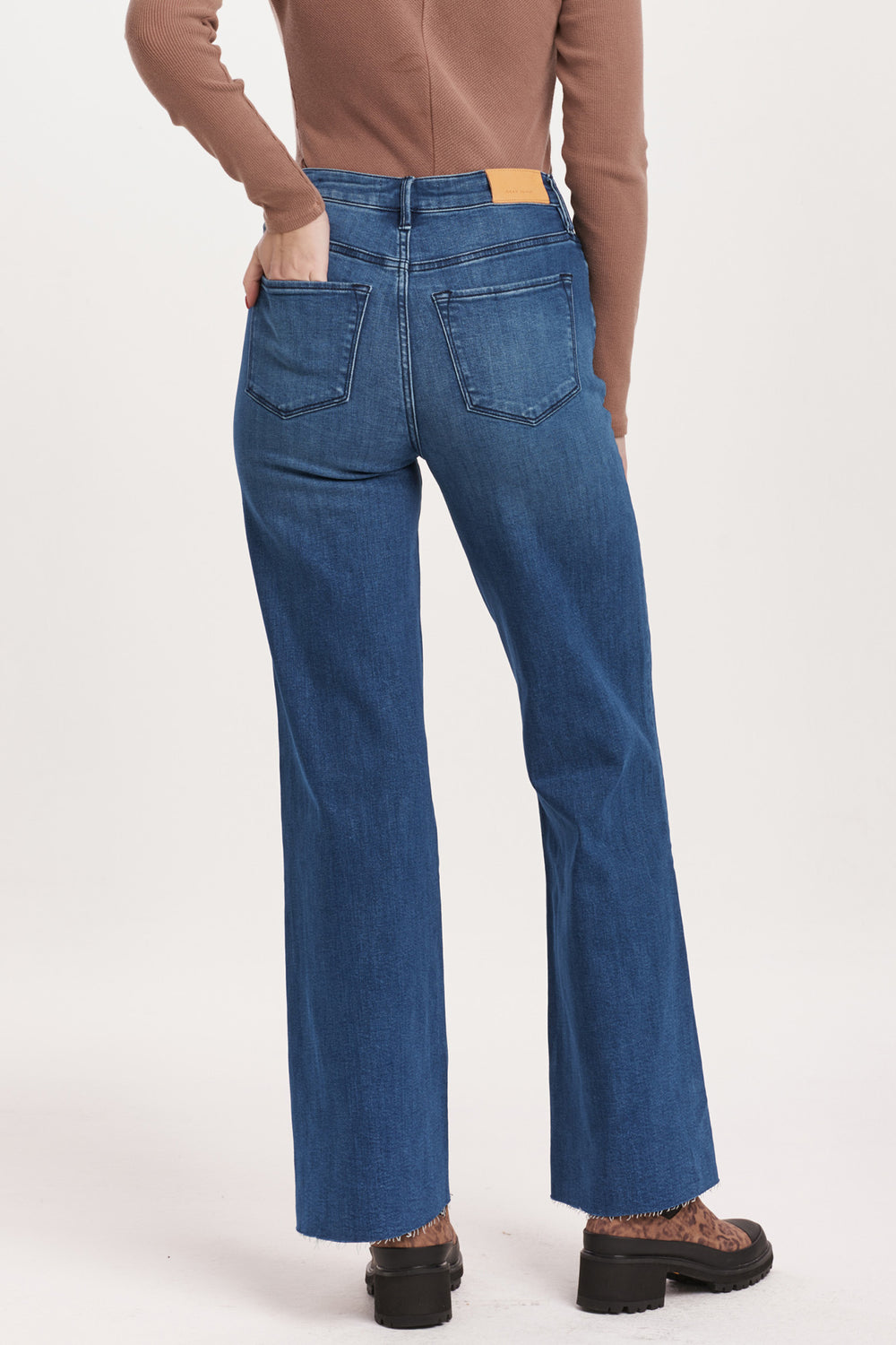 image of a female model wearing a FIONA HIGH RISE FULL INSEAM RAW CUT HEM JEANS VIOLET BLUE DEAR JOHN DENIM 